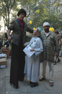 Sr. Ann with a stilt walker - Trinity WS Celebration Sunday 2009