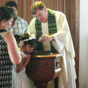 Fr. Phil Byrum Baptising